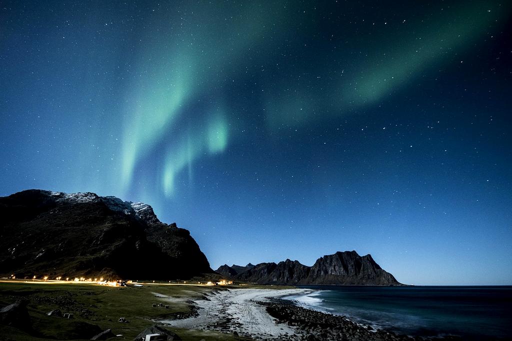 Northern lights over mountains